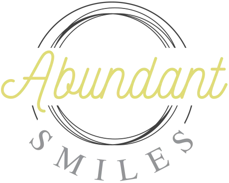 A logo for Abundant Smiles
